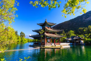 Lijiang old town scene-Black Dragon Pool Park. you can see Jade Dragon Snow Mountain in the background.